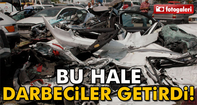 Darbeci askerlerin tanklarla ezdiği araçlar, otoparka çekildi