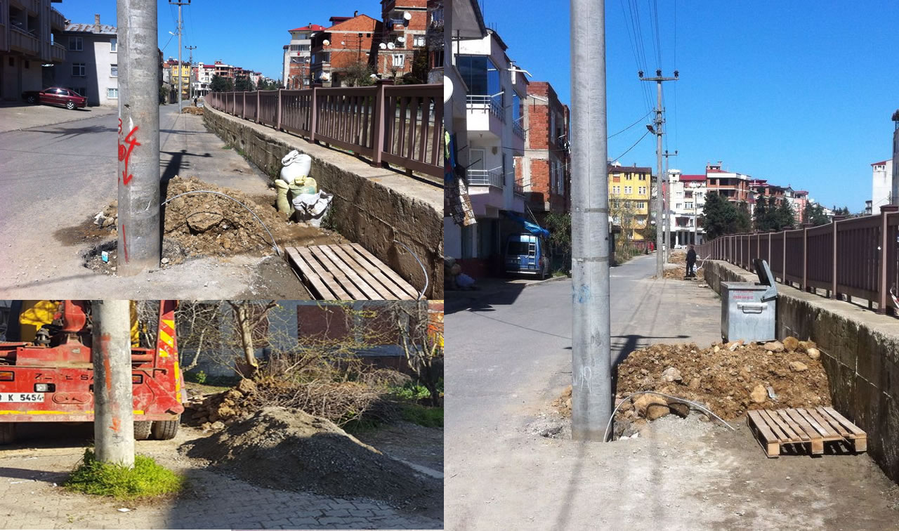 Yol ortasında kalan direkleri yol kenarlarına alıyoruz